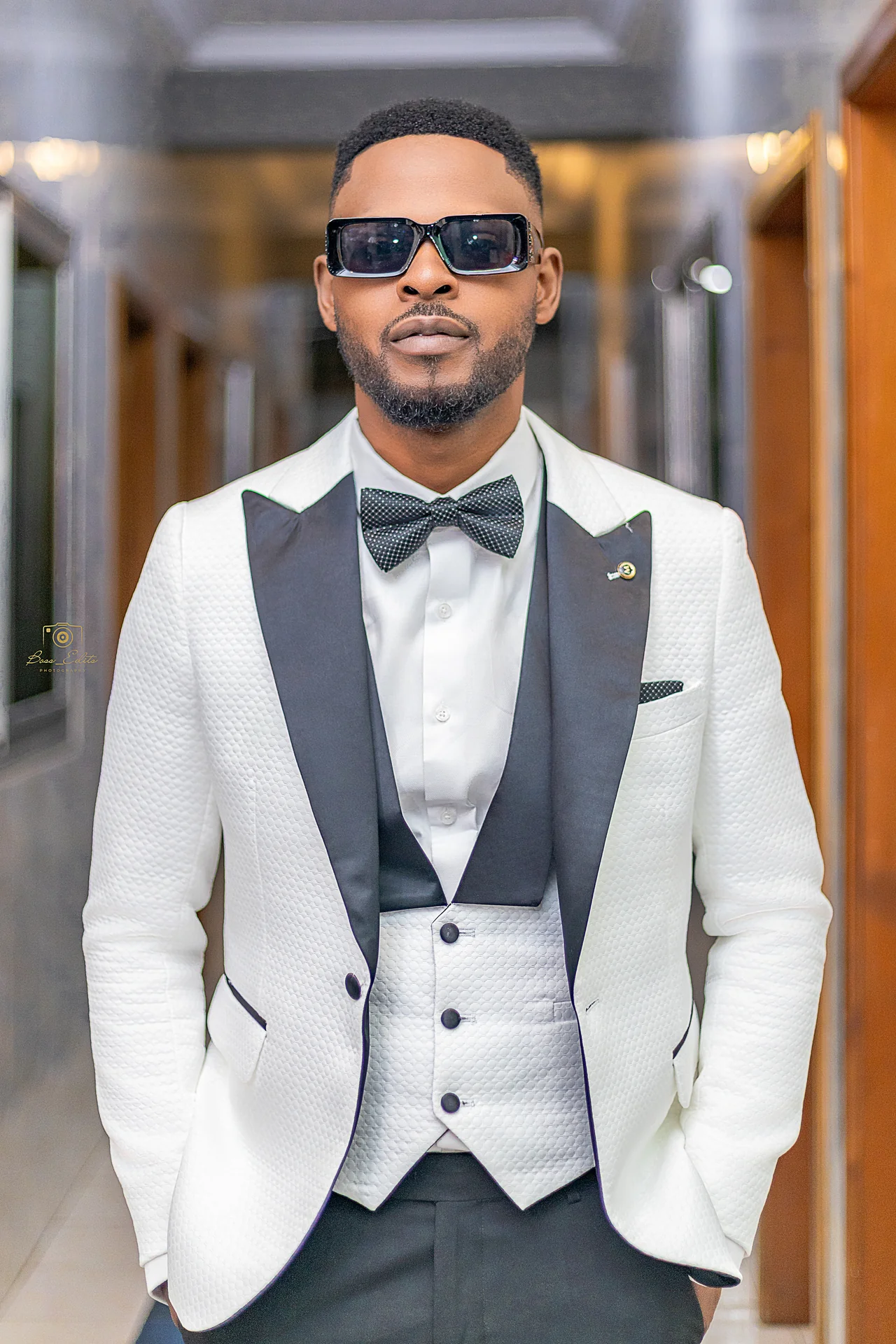 The White Tuxedo Groom