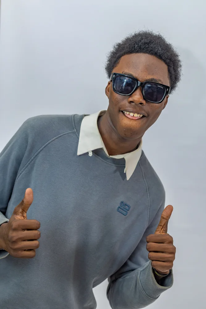 Thumbs-Up Charisma in Shades